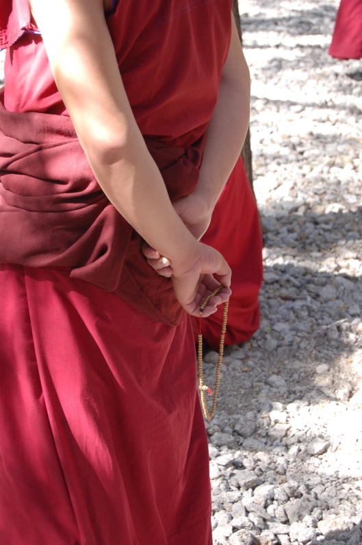 Monk with prayer beads at Sera Monastery, Lhasa, Tibet